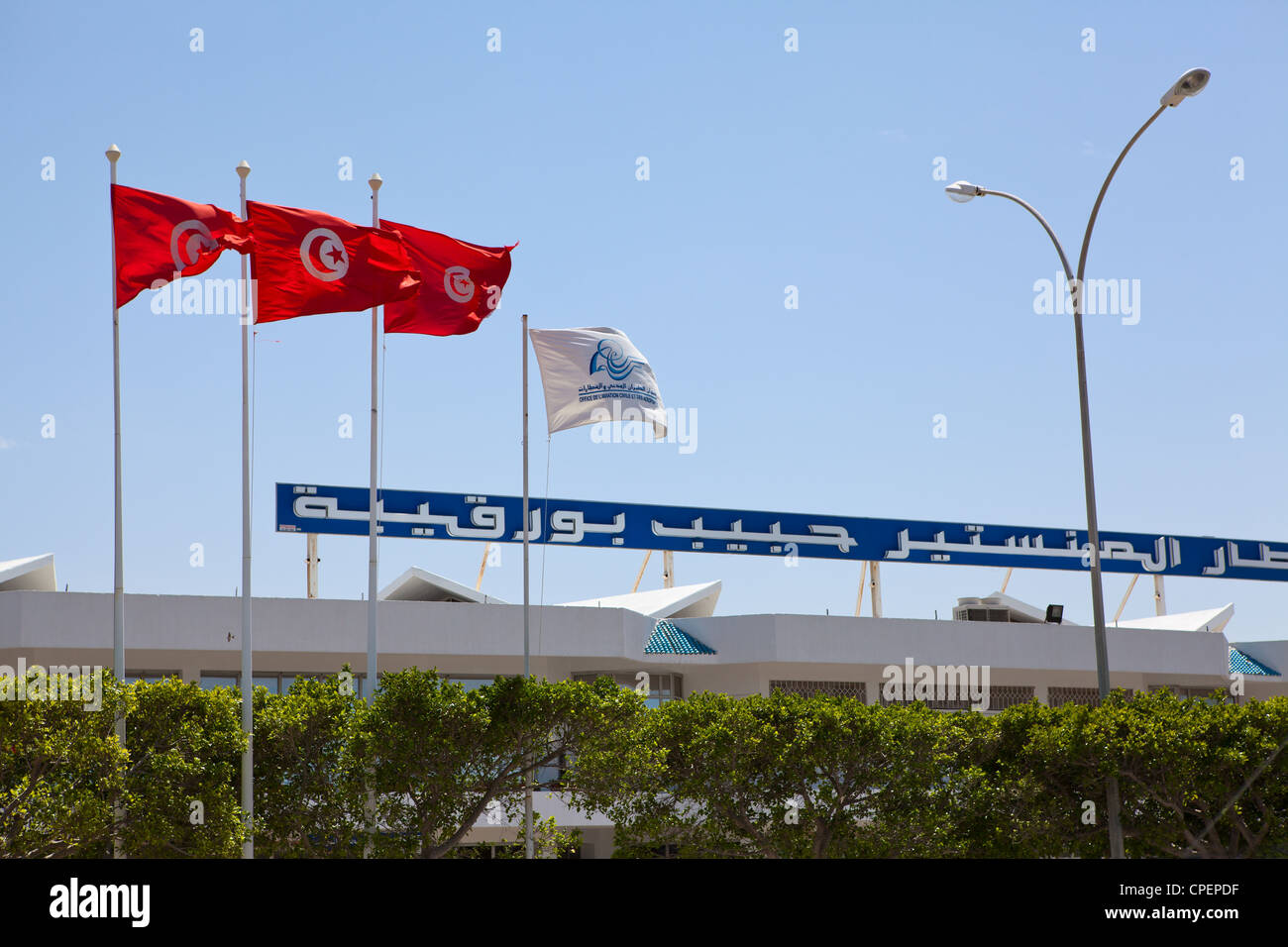 Habib Bourguiba International airport in Monastir, Tunisia. Close up of flags on building Stock Photo