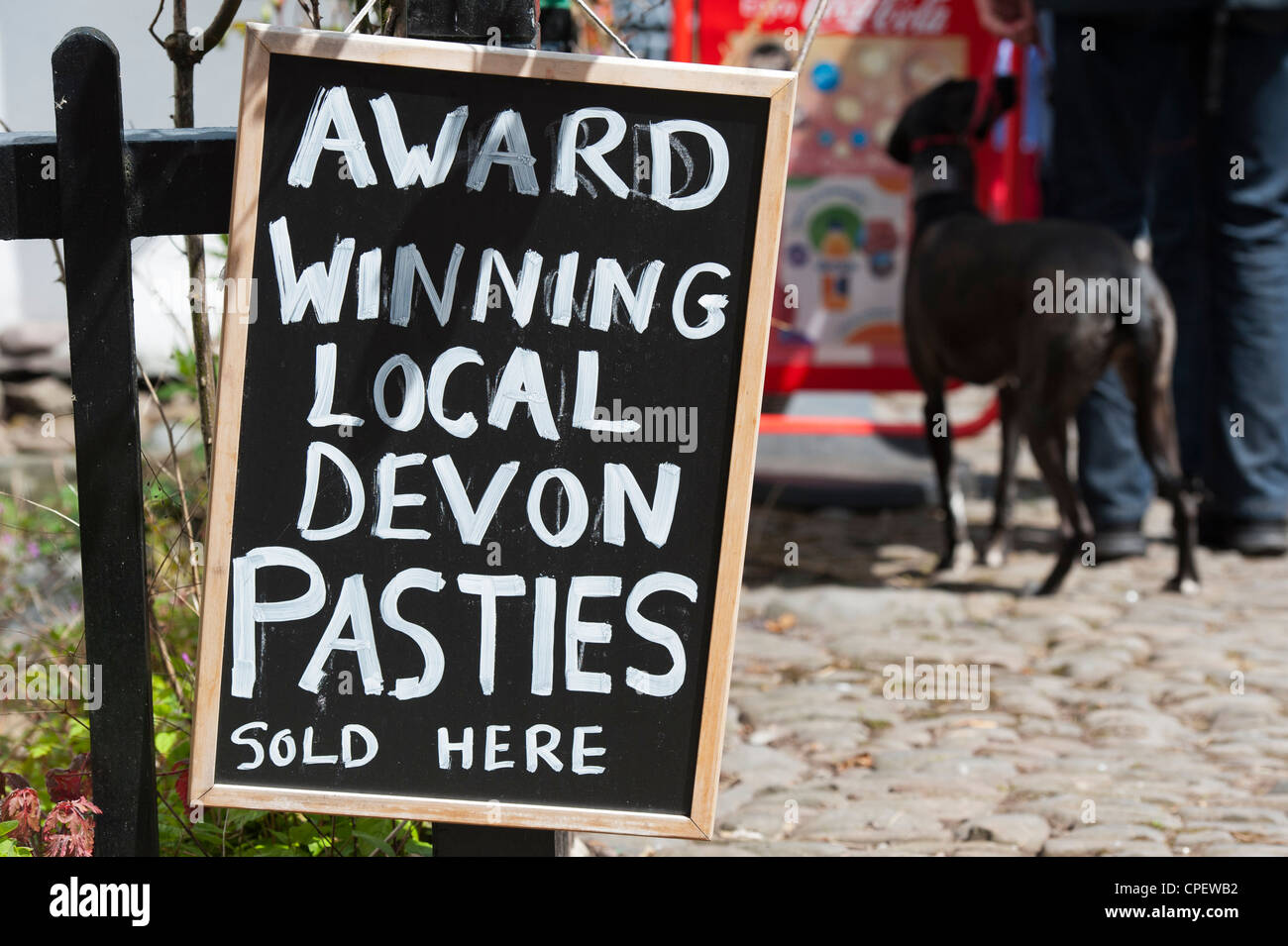 Pasty sign in Clovelly. Historical privately owned traditional Devon Village. England Stock Photo