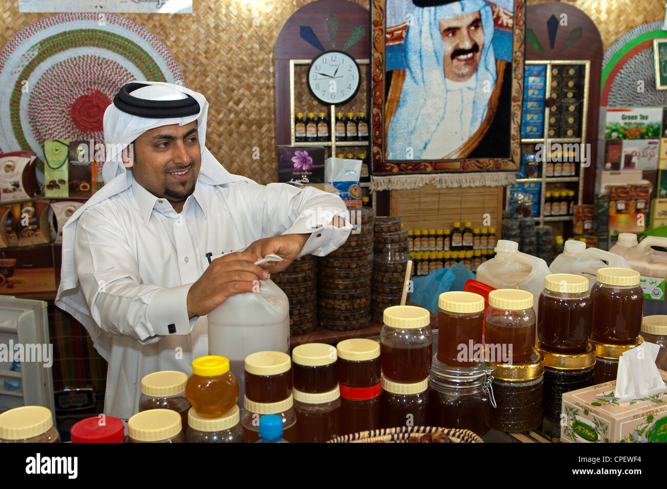 Honey merchant at the souq of Doha, Qatar Stock Photo Alamy