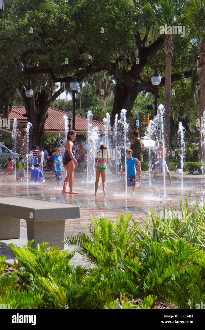Florida Winter Garden,West Plant Street,Water Park,fountain,boy boys,male kid kids child children youngster youngsters youth youths girl girls,female, Stock Photo