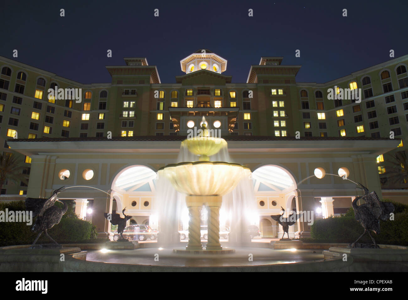 Orlando Florida,Rosen Shingle Creek,hotel,outside exterior,front,entrance,front,entrance,resort,fountain,water,sculpture,heron,bird,nigh Stock Photo