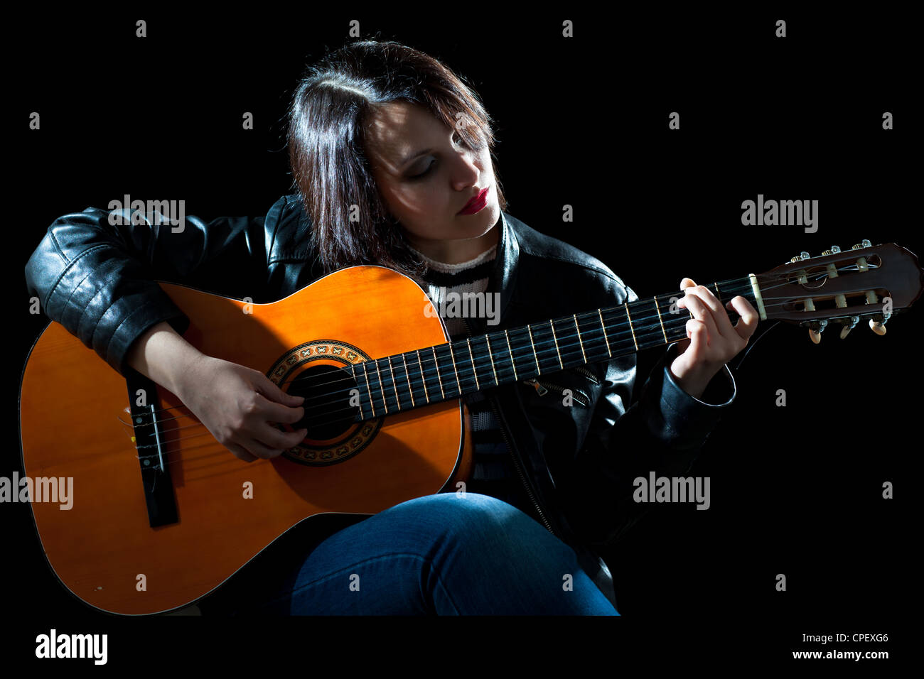 Woman Playing Classical Guitar in a Concert Stock Photo - Alamy
