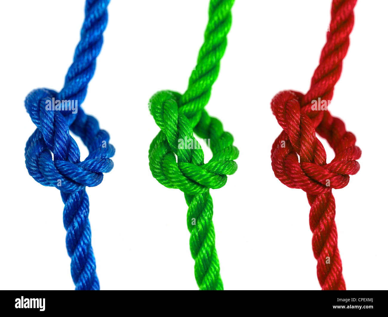 Pieces of rope isolated against a white background Stock Photo - Alamy
