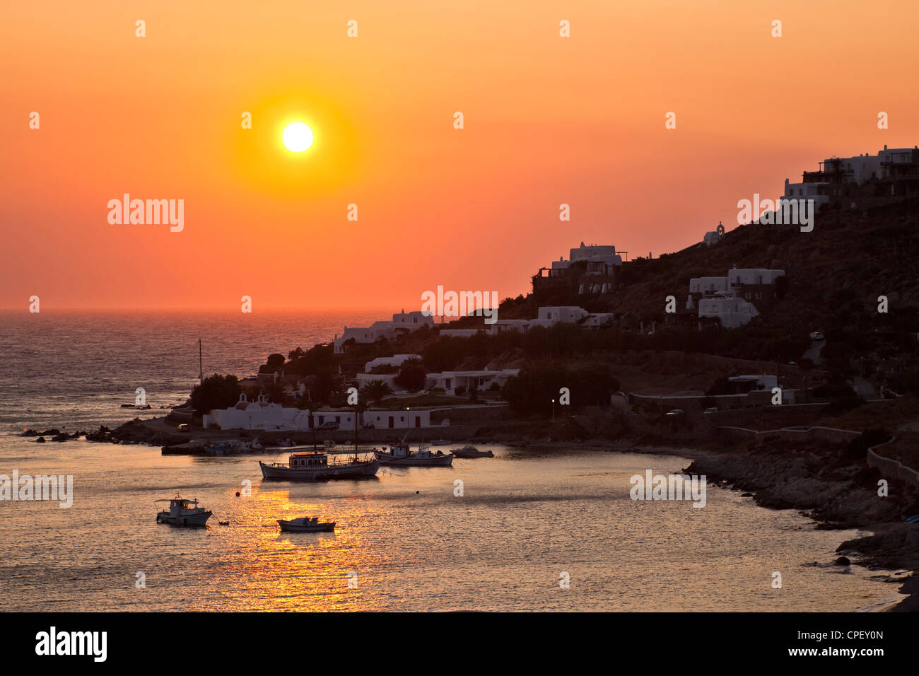 The village of Agios Ioannis on the west coast of Mykonos, Greece at sunset  Stock Photo - Alamy