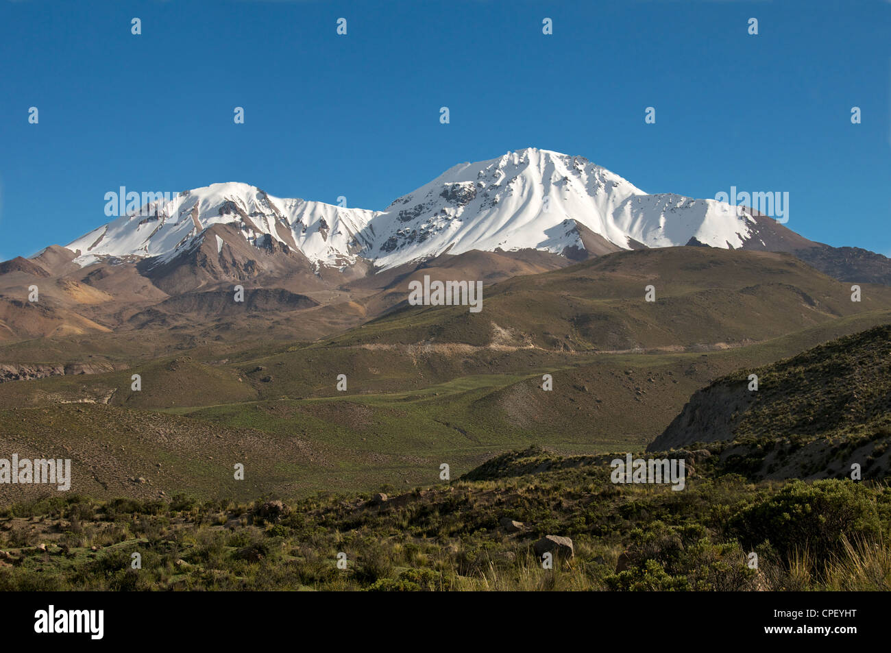 Snow capped mountains above Putre Northern Chile Stock Photo