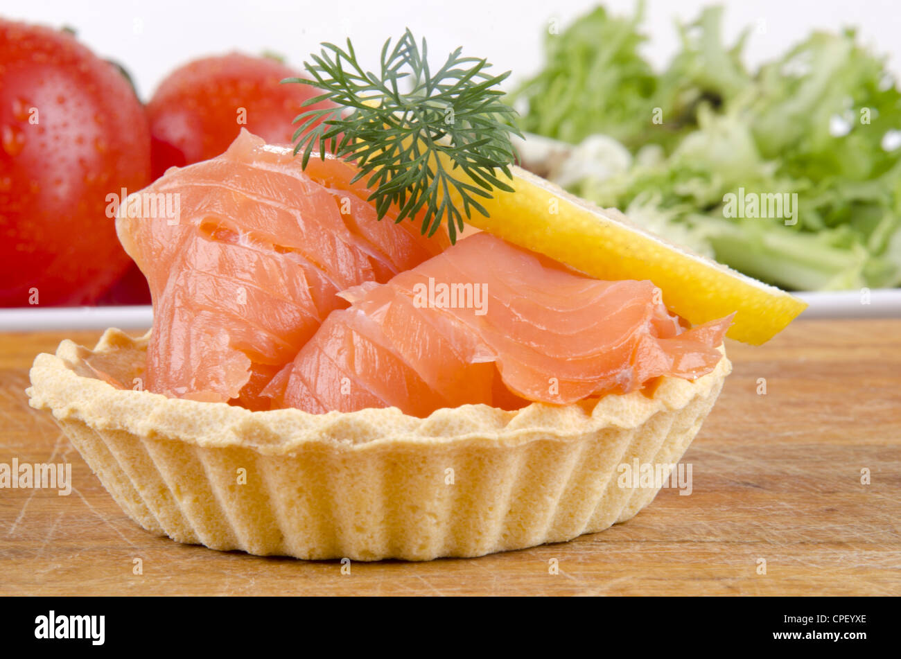 pastry cases as party snack filled with smoked salmon Stock Photo Alamy