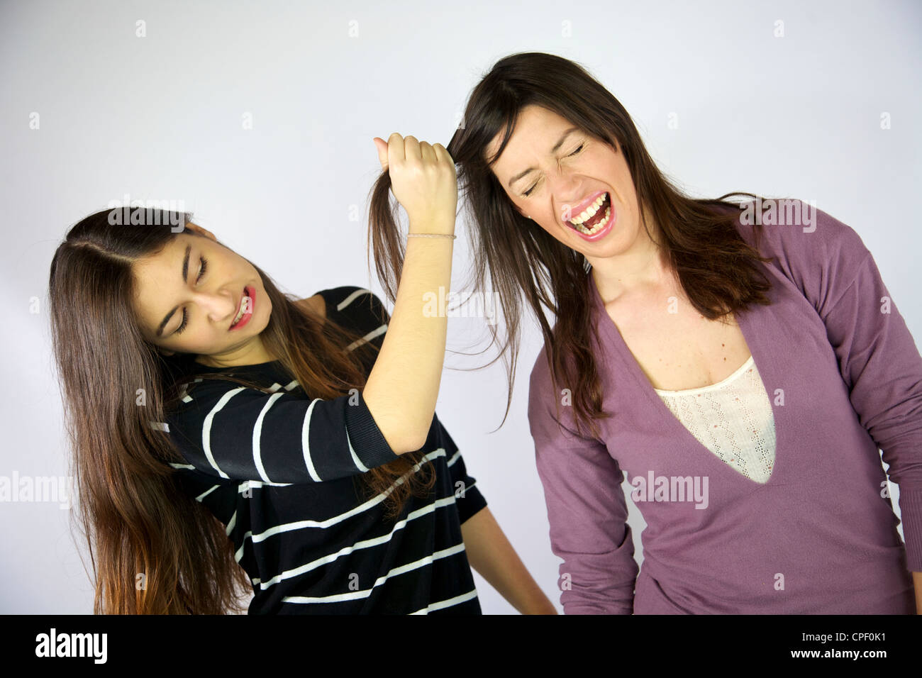 Pull hair fight hi-res stock photography and images - Alamy