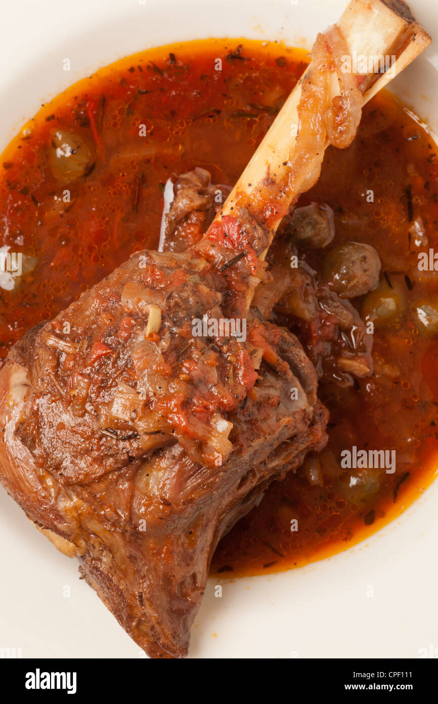 Lamb shanks braised in tomato sauce Stock Photo