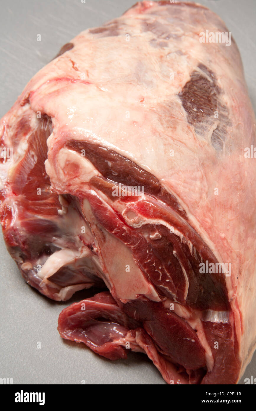 raw, trimmed, leg of mutton Stock Photo