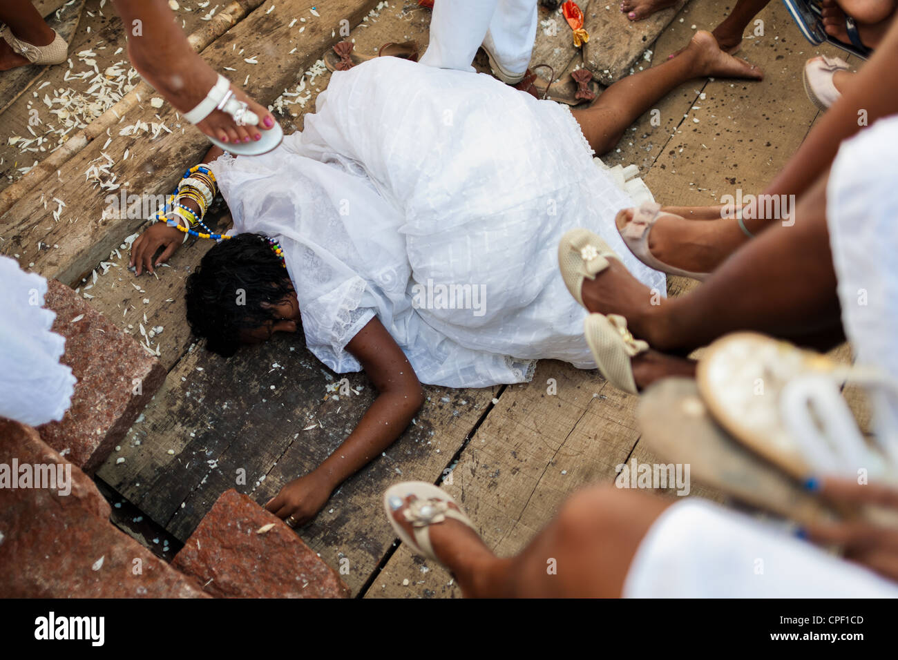 A Candomblé faithful becomes possessed during the ritual ceremony in honor to Yemanjá in