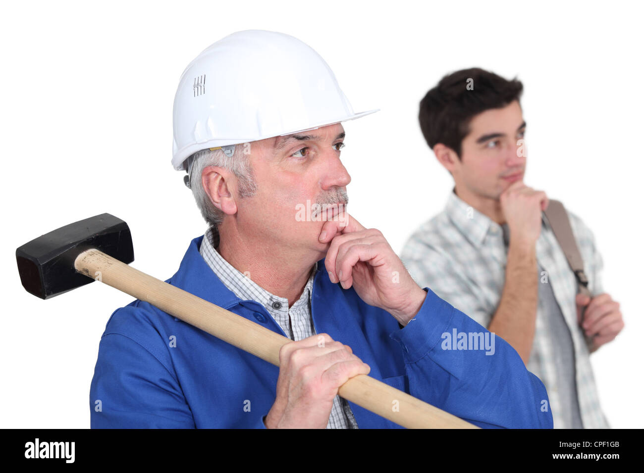 craftsman and apprentice thinking Stock Photo