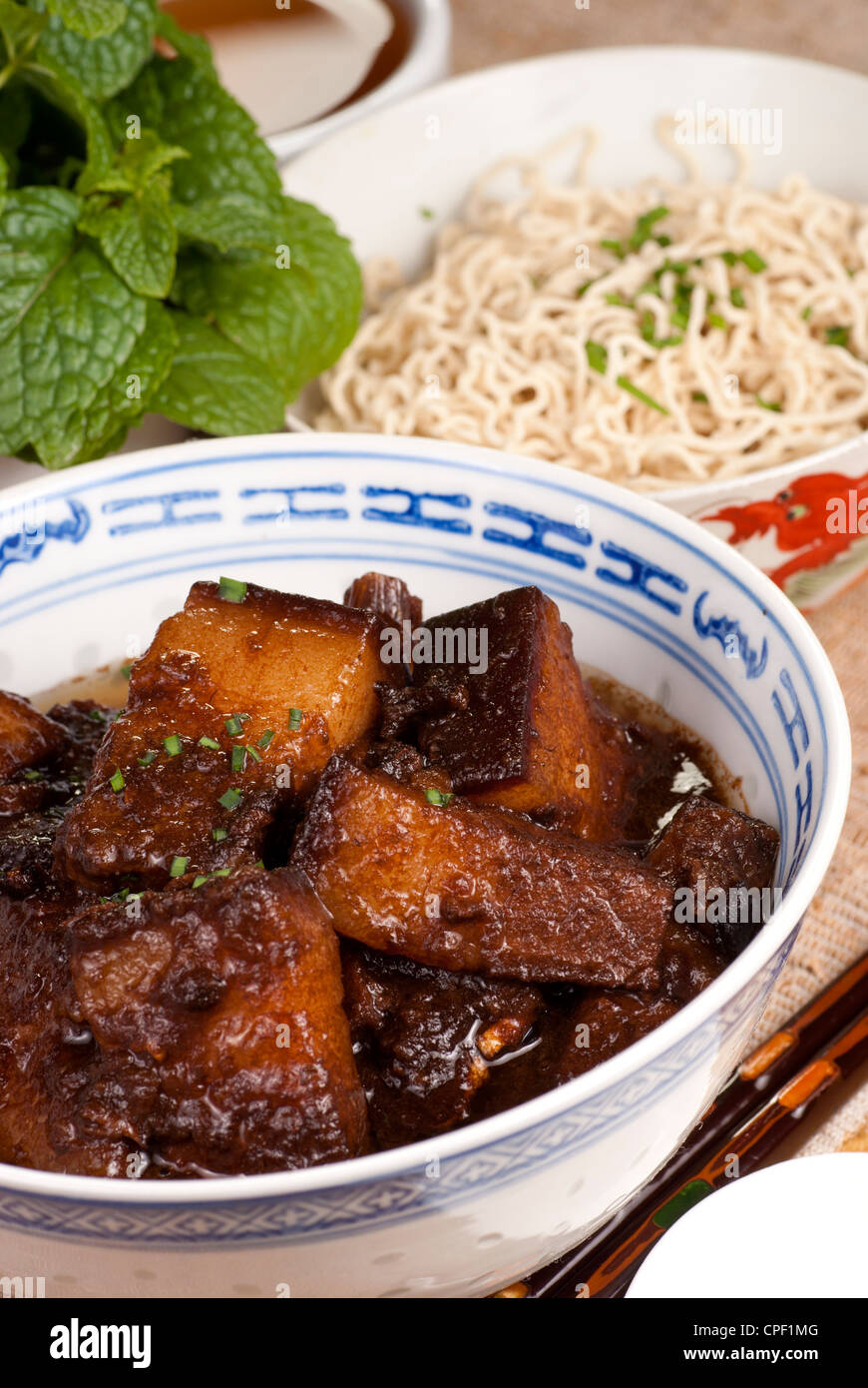 Braised Pork Belly Slices Cooked in Dark Soy Sauce Stock Photo Alamy