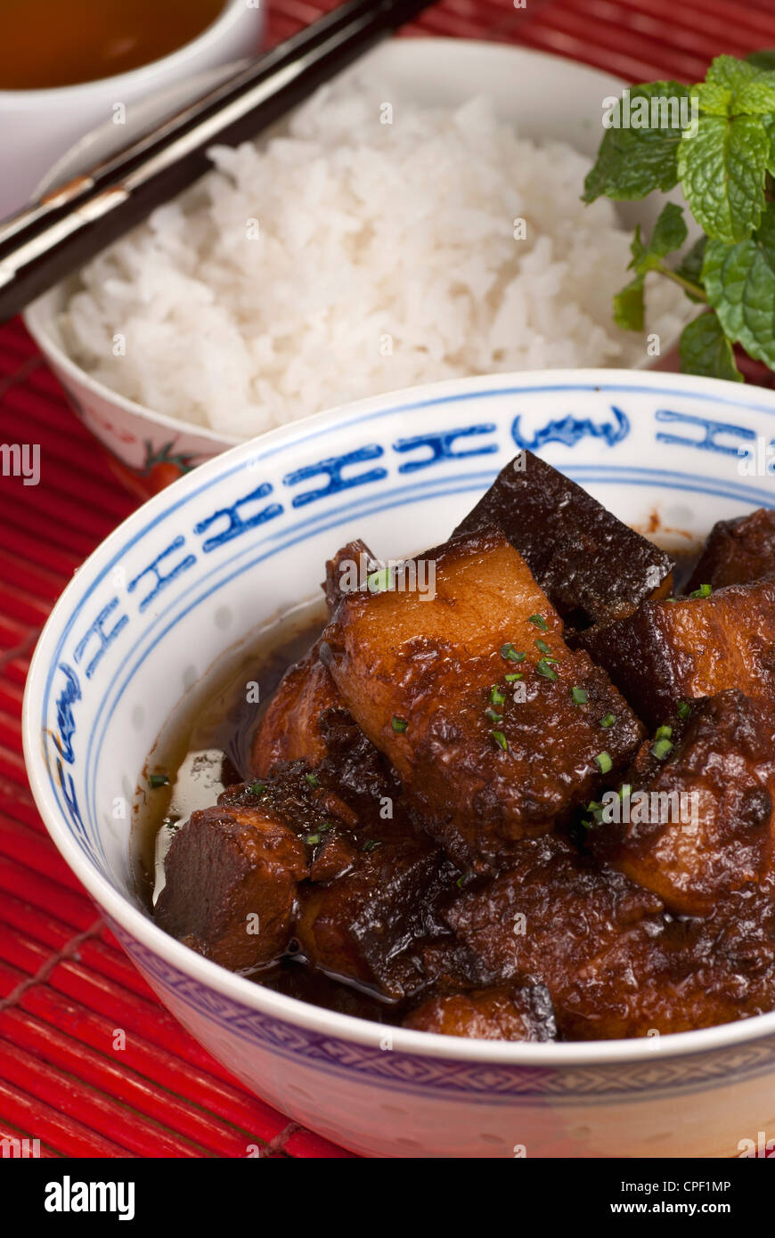 Braised Pork Belly Slices Cooked in Dark Soy Sauce Stock Photo Alamy
