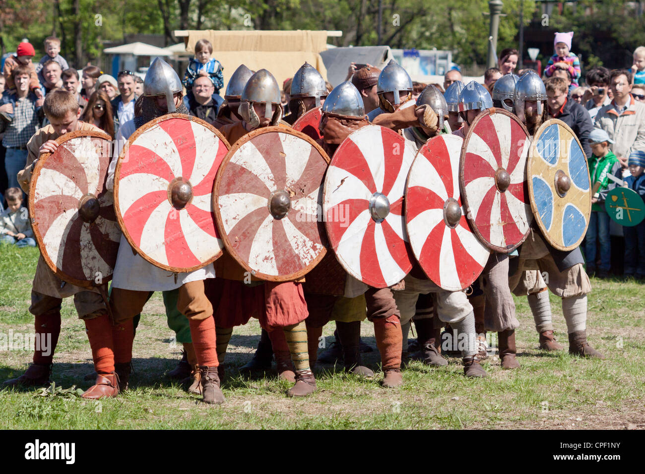 Group of warriors with shields Stock Photo - Alamy