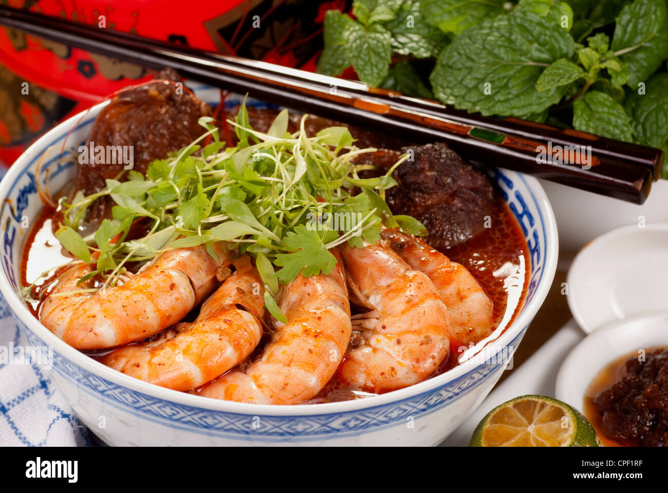 Sarawak Laksa Garnished With Coriander Sprigs Stock Photo Alamy