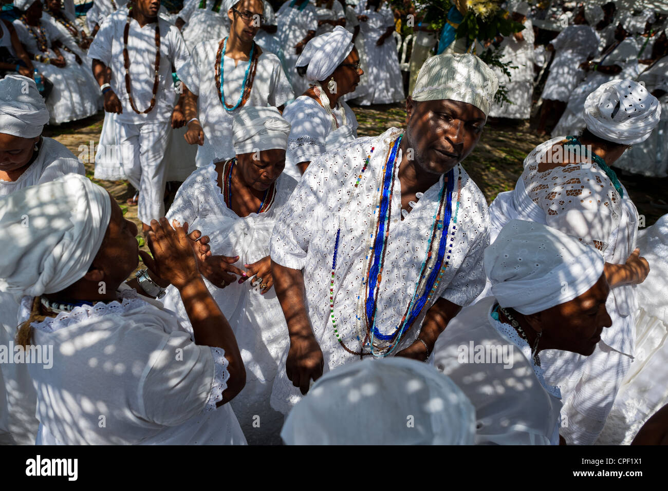 Candomblé worshippers dance and sing during the ritual ceremony in