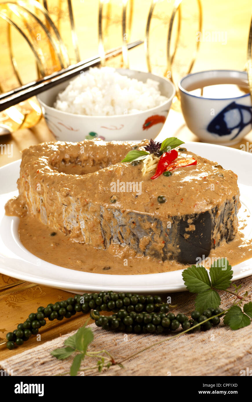 Catfish in Green Peppercorn Fried Curry Stock Photo Alamy