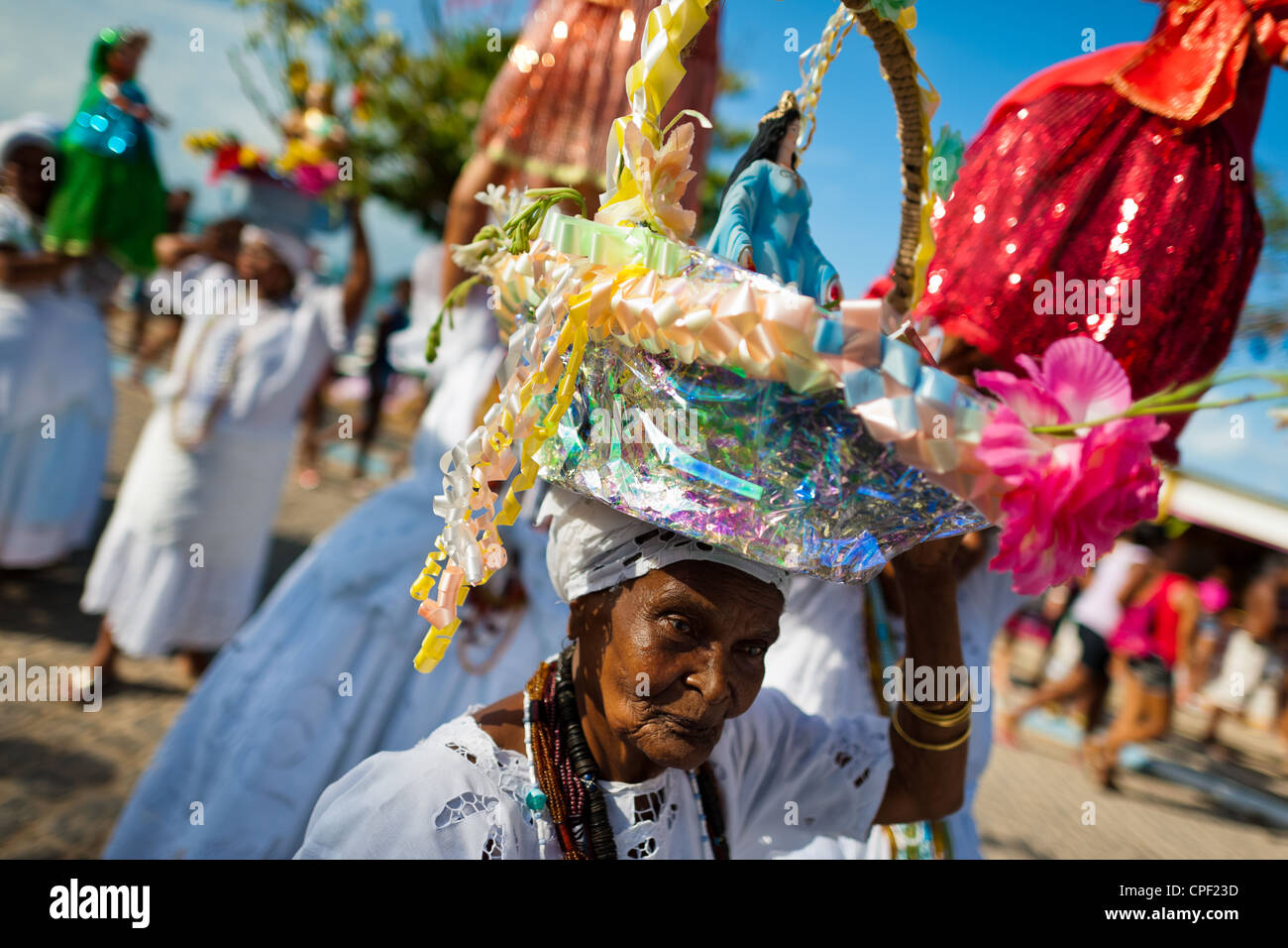 A Baiana Woman Carries A Religious Figurine During The Ritual A Baiana Woman Carries A Religious Figurine During The Ritual