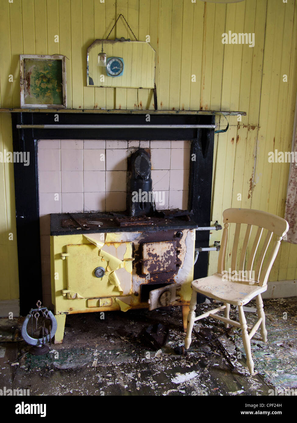 Yellow Rayburn and Chair, Isle of Harris, Scotland Stock Photo