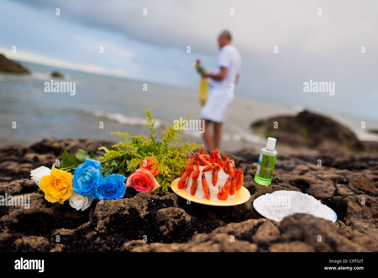 Offerings (flowers, perfume, rice) put on the seashore during the ritual  celebration of Yemanjá in Salvador, Bahia, Brazil Stock Photo - Alamy