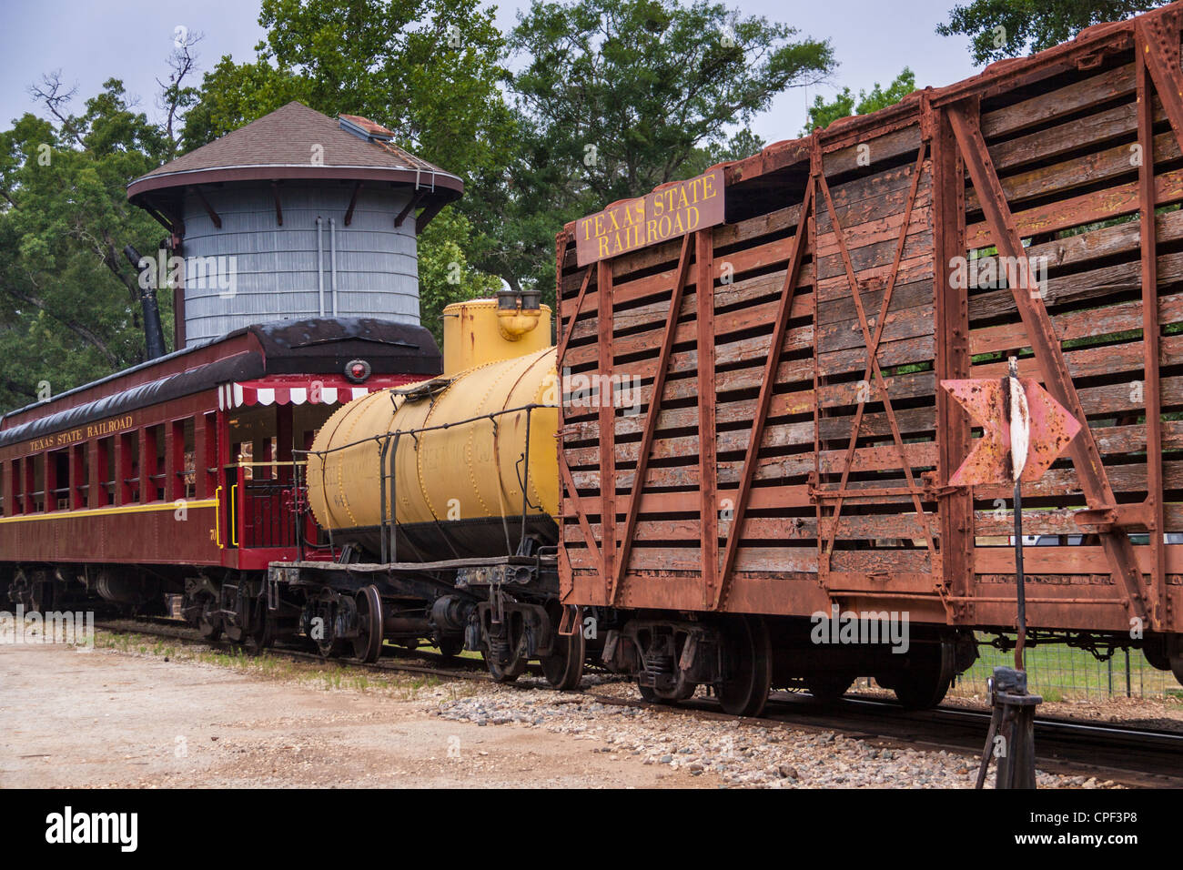 Vintage rail cars and water tower on "Texas State Railroad" at Rusk