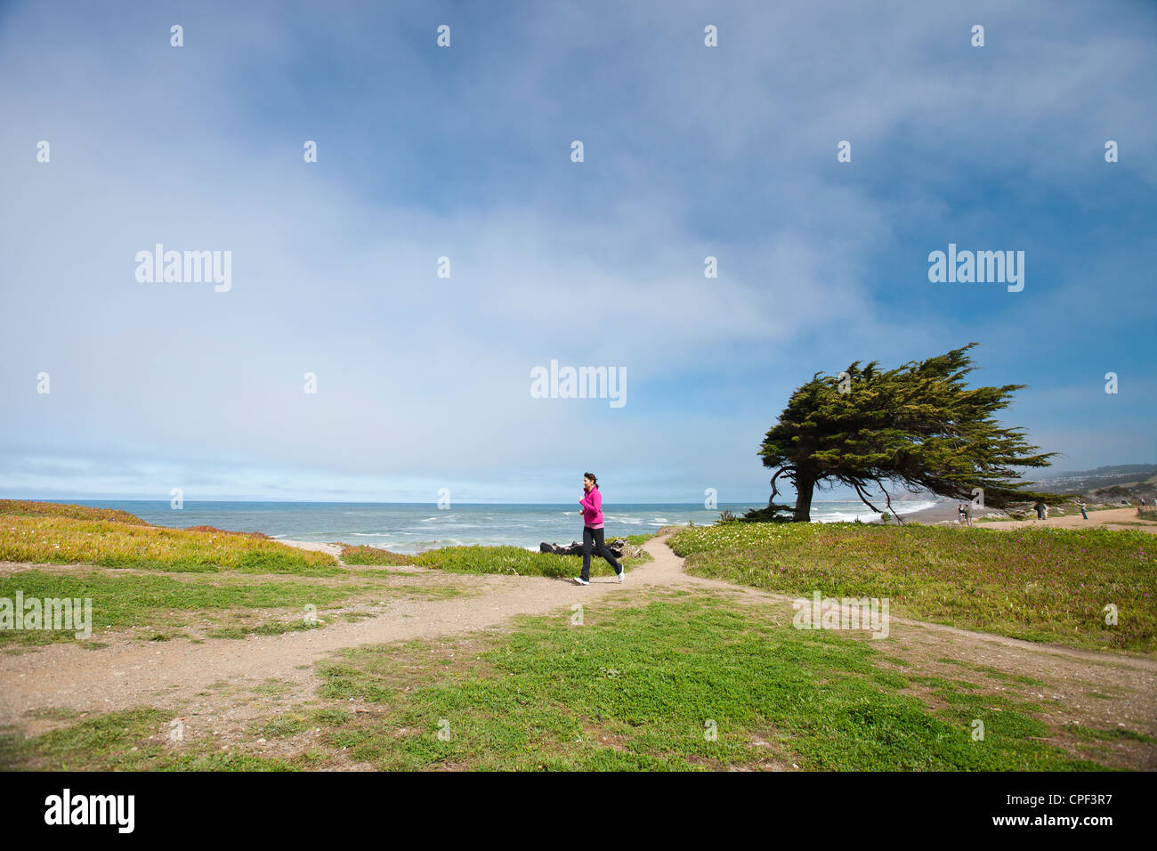 Jogging at beach Stock Photo