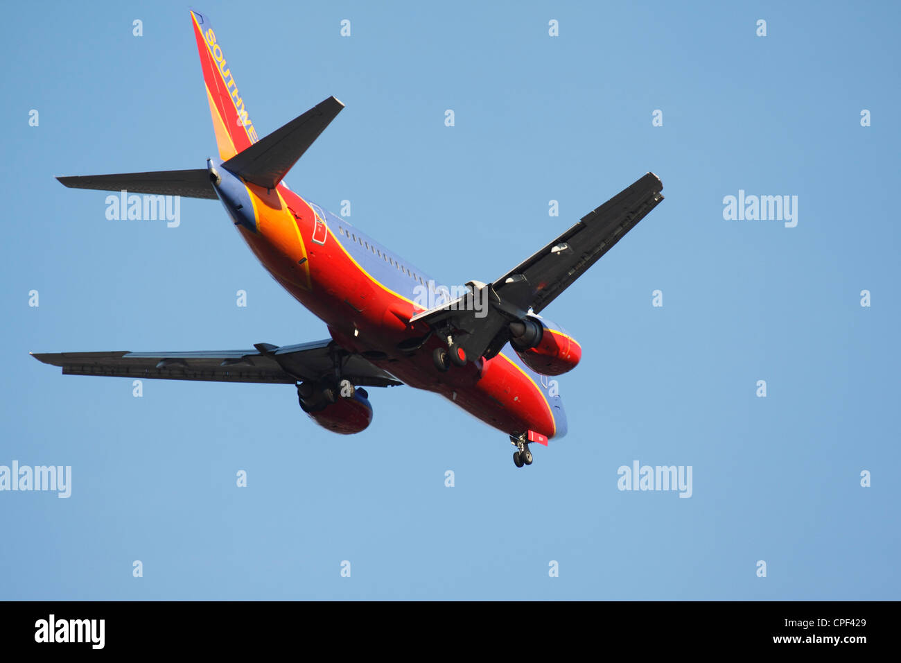 An airliner descends for landing Stock Photo