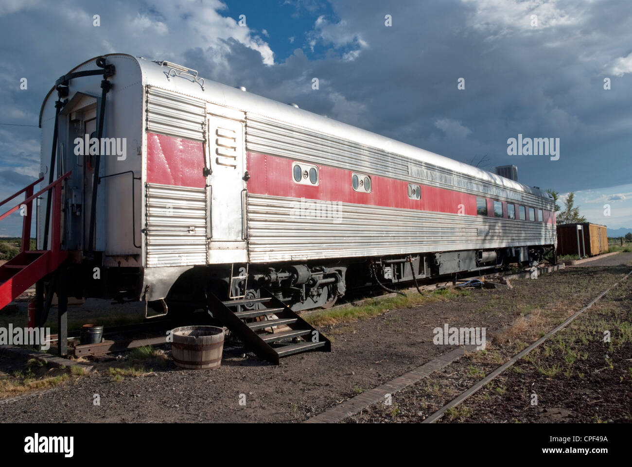 A passenger car sits on the tracks at the Lamy station. Stock Photo