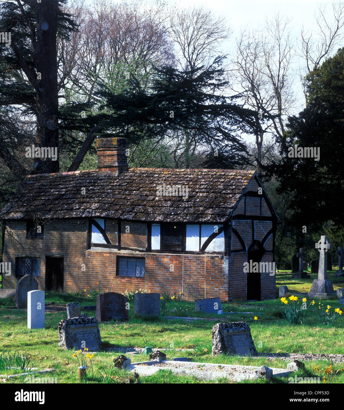 The Priests house in the churchyard of Itchingfield Parish church, West