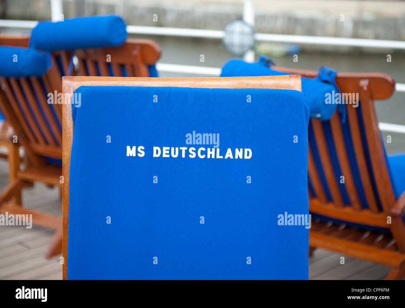 Deckchairs with branded cushion aboard the super deluxe cruise liner MS Deutschland, operated by Reederei Peter Deilmann Stock Photo