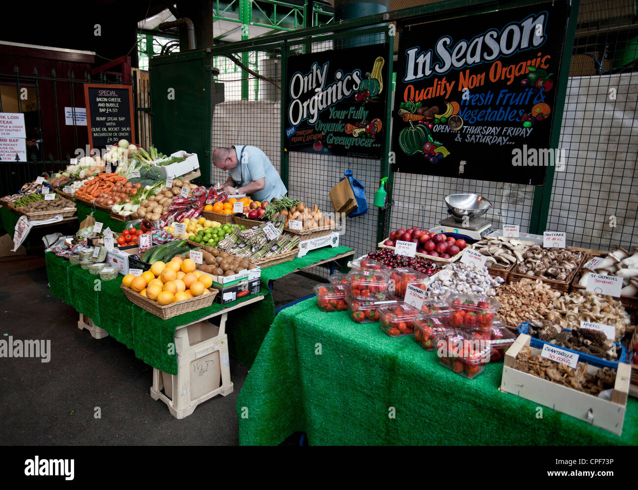 An organic fruit and vegetable stall in Borough Market, London, England, UK Stock Photo