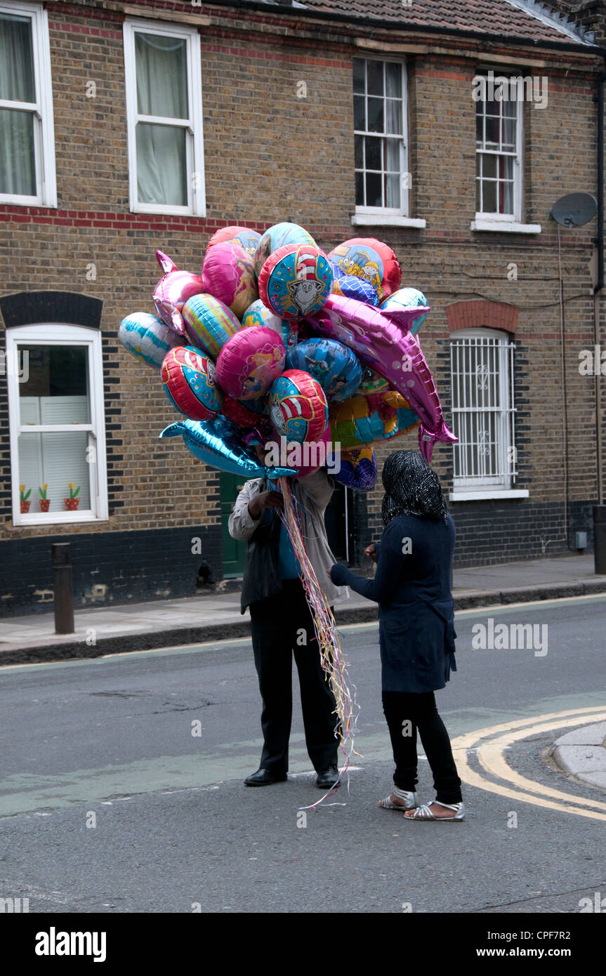 Boishakhi Mela, celebration for Bangladesh New Year. Man selling helium