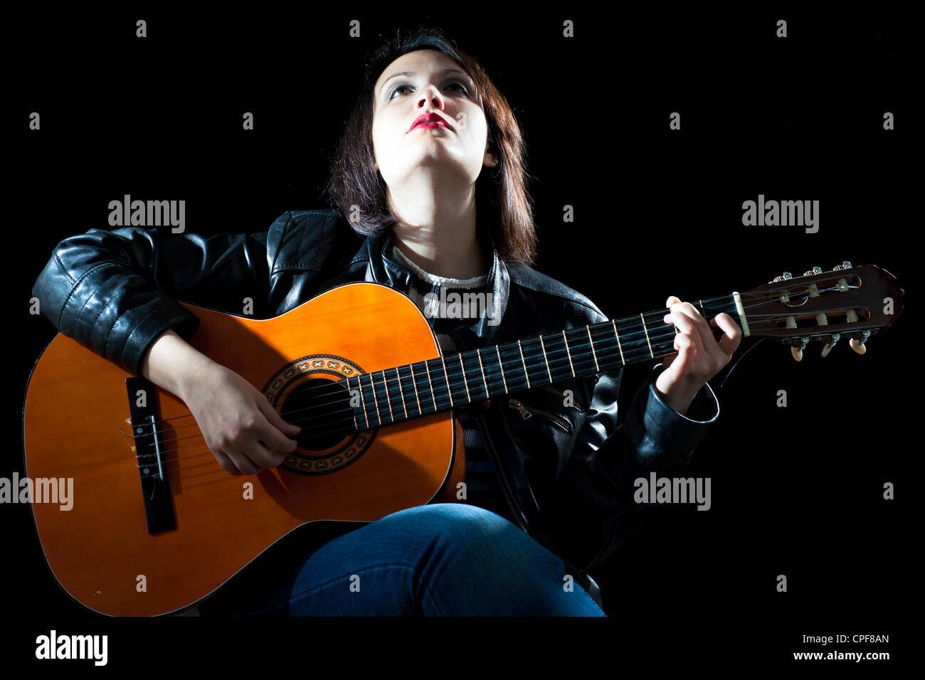 Woman Playing Classical Guitar in a Concert Stock Photo - Alamy