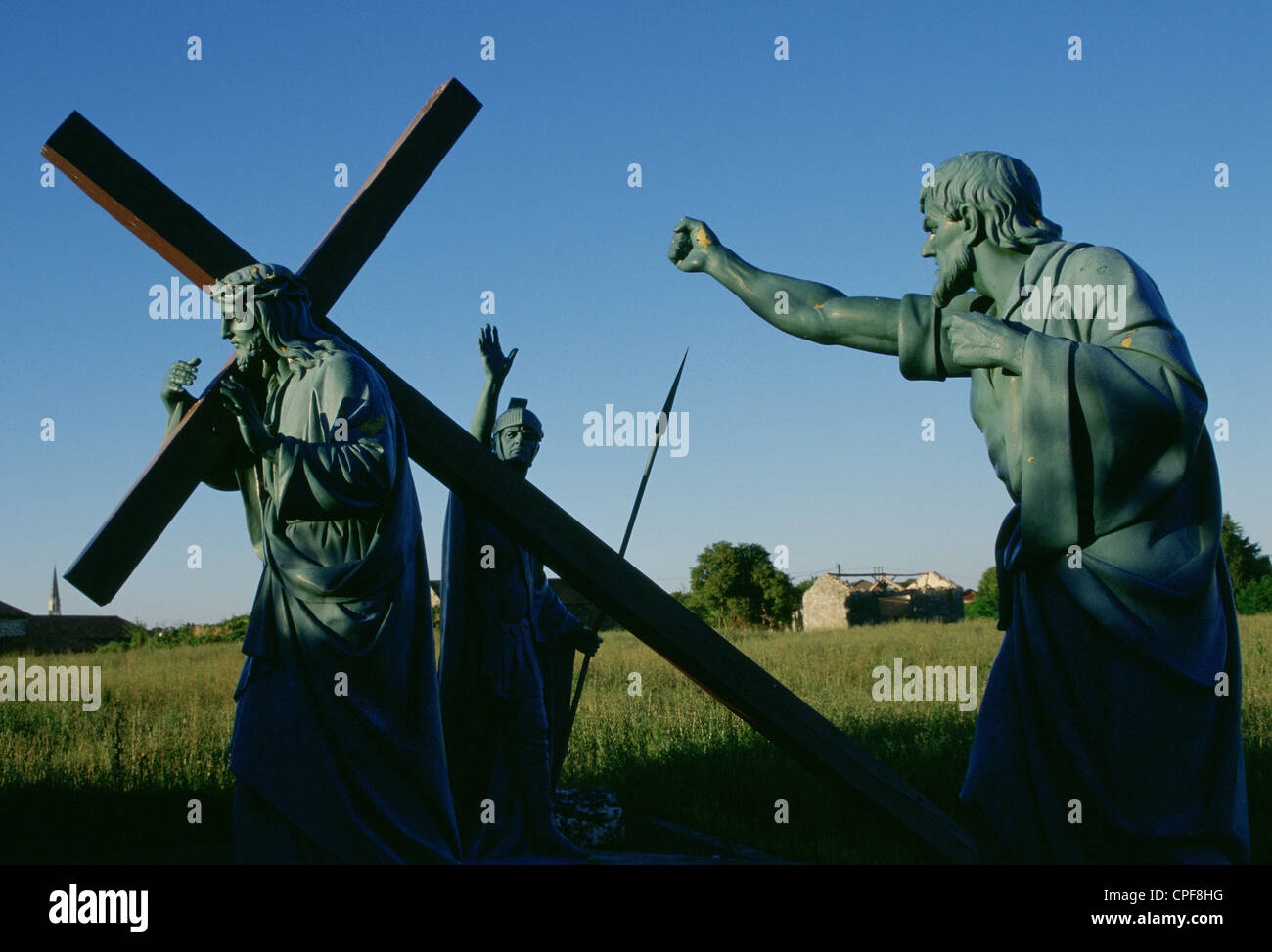 Statue of Jesus carrying the Cross surrounded by a roman guard and a