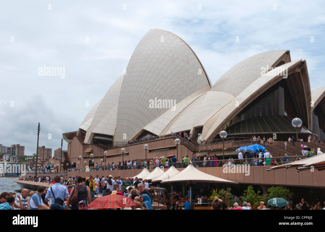 Restaurant and umbrellas in area of famous Sydney Opera House in ...