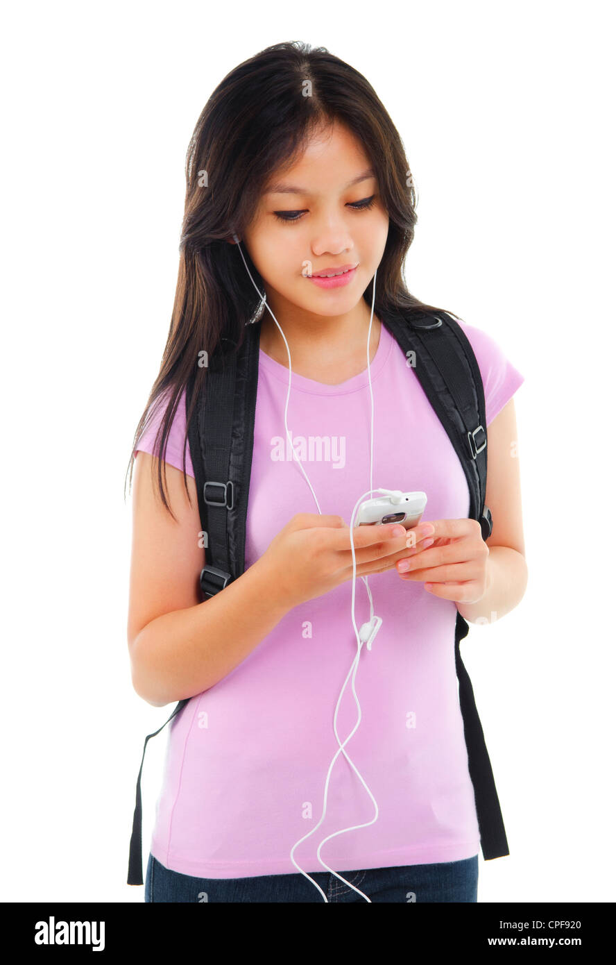 Young Asian Teen Texting And Listening To Music Young Asian Teen Texting And Listening To Music