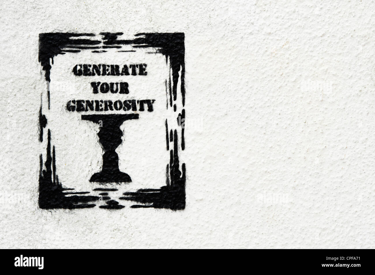 Generate your generosity graffiti on a wall Stock Photo