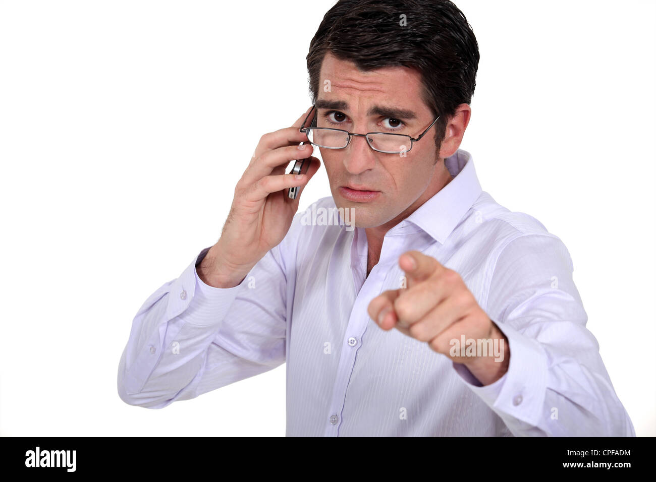 A boss blaming one of his employee. Stock Photo