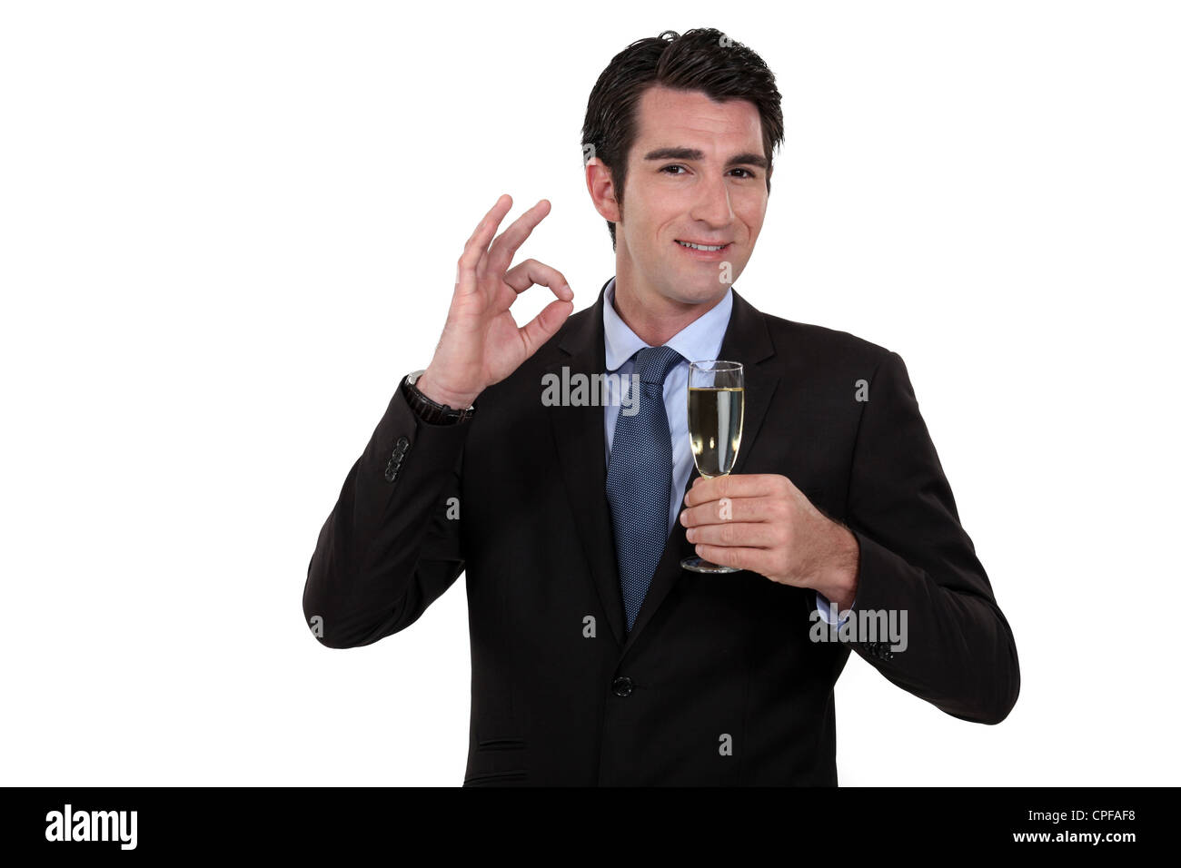 Businessman with champagne Stock Photo