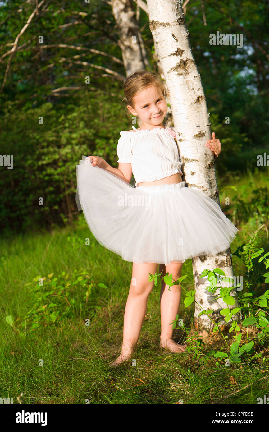 Beautiful girl in the forest outdoor Stock Photo - Alamy