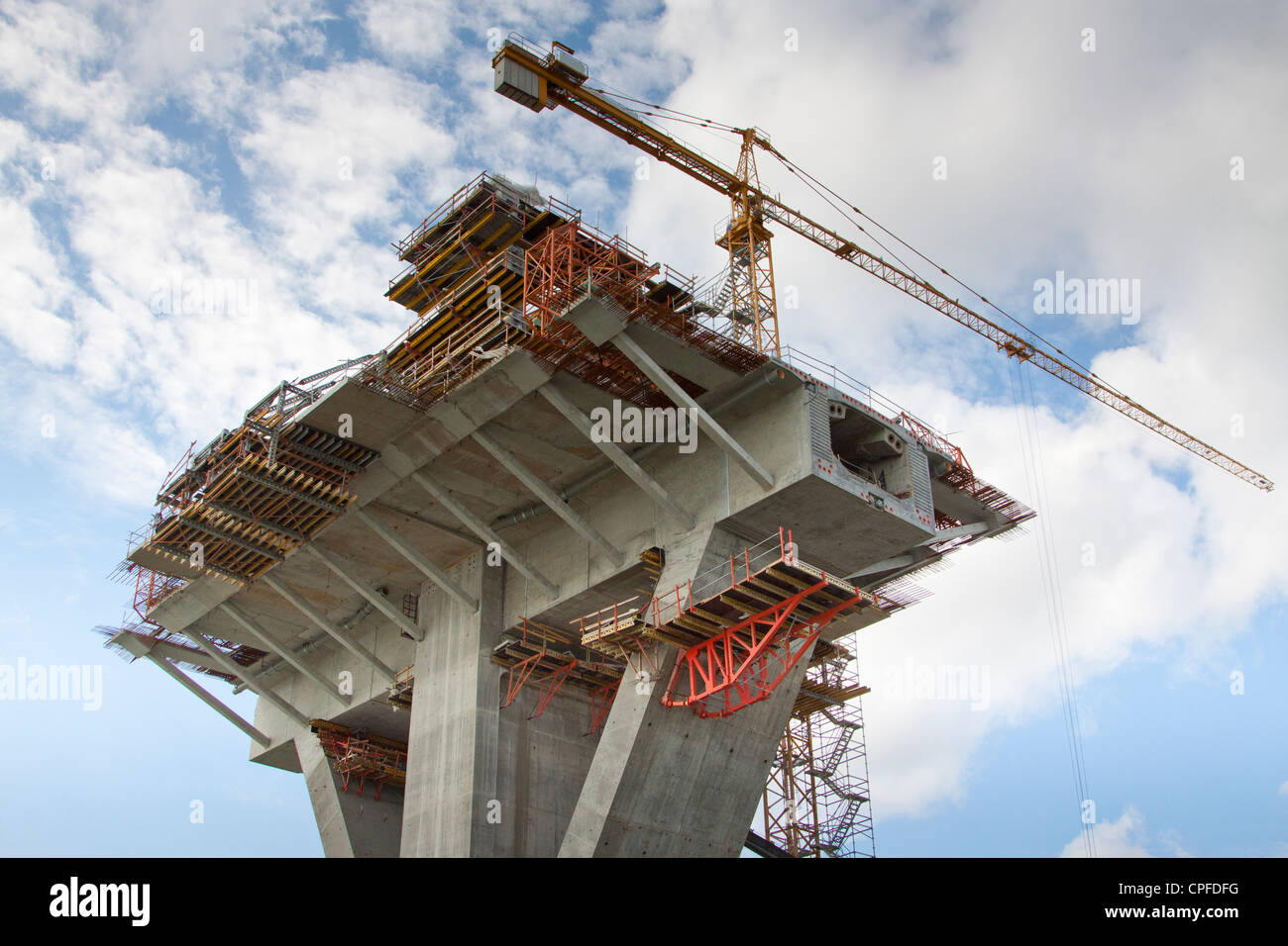 Halffinished bridge pylon with crane, construction site of the VidinCalafat Bridge between