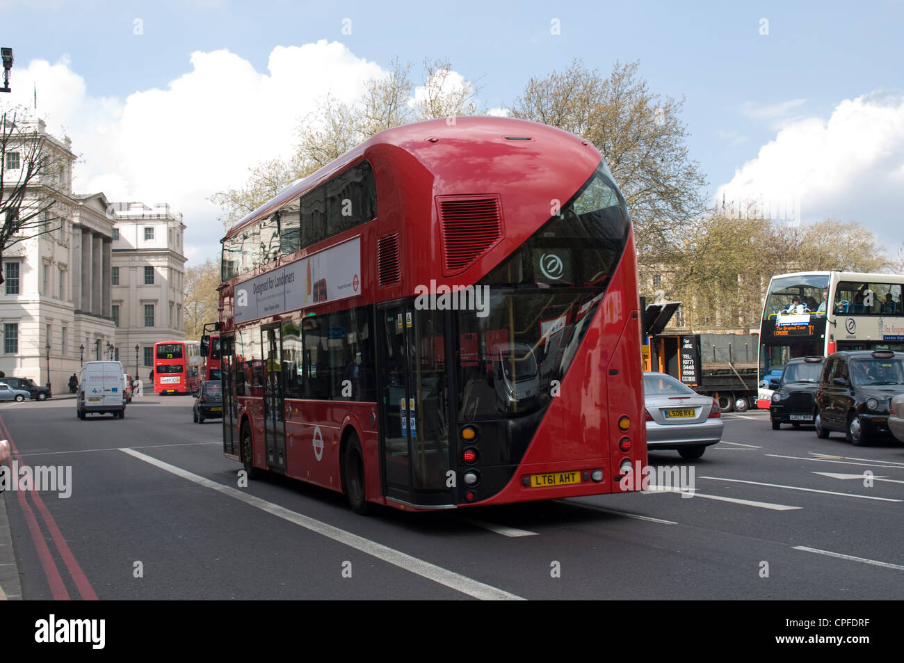 The New bus for London on a trail run in Grosvenor Place, London. Eight buses will be used as prototypes to test the vehicles. Stock Photo