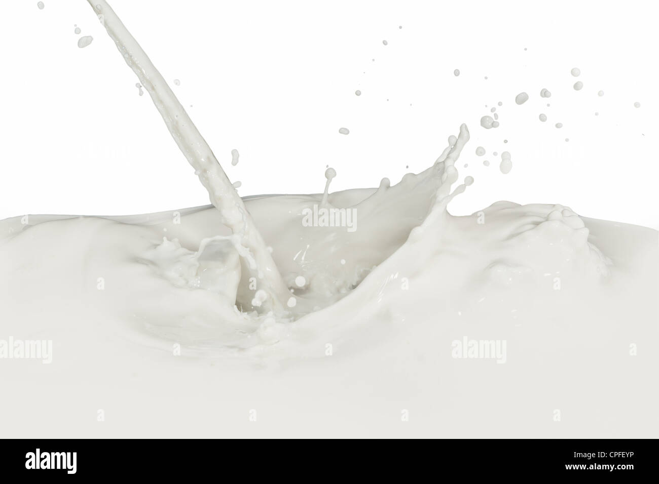 splashing milk isolated on white background Stock Photo - Alamy