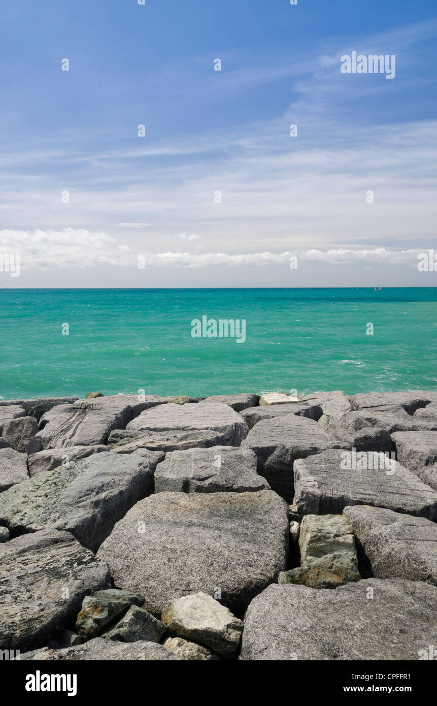 Sea, sky and rocks in Italy Stock Photo - Alamy
