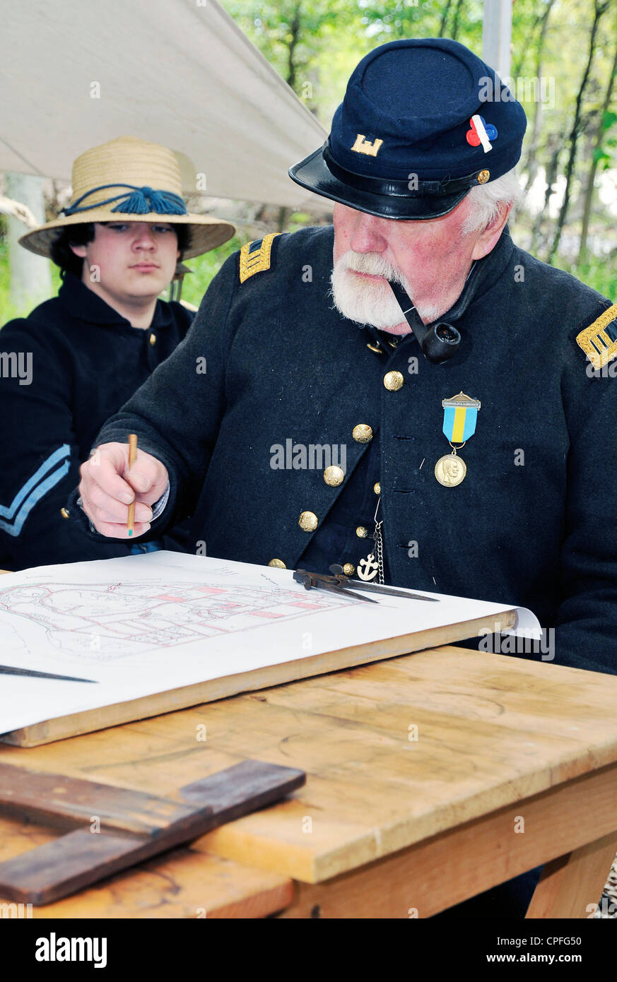 The Military engineer bent over drawings, Civil War reenactment, Bensalem, Pennsylvania, USA Stock Photo