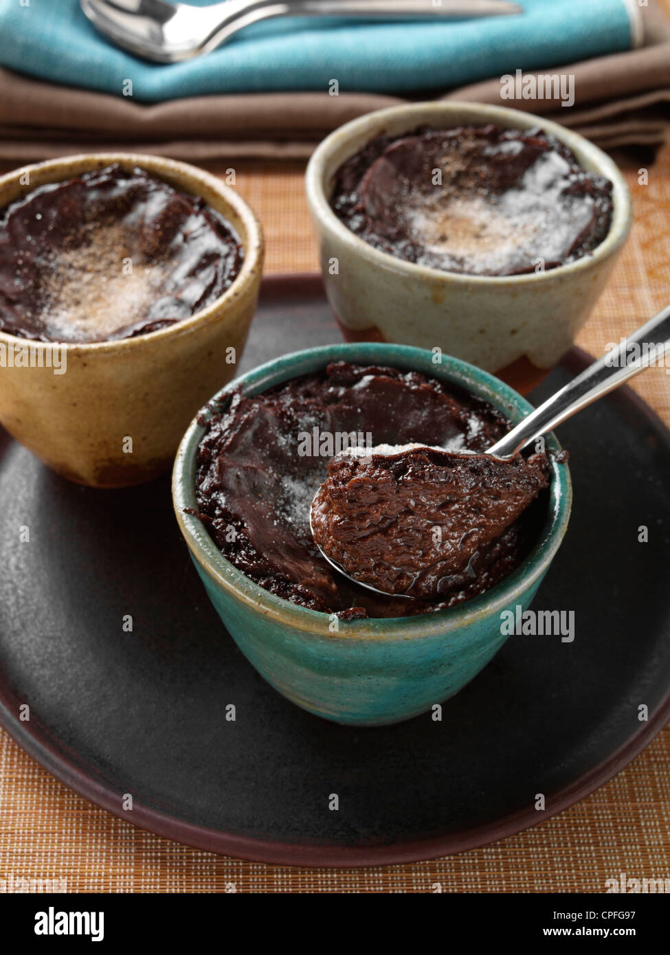 Individual portions of banana fudge pudding Stock Photo Alamy