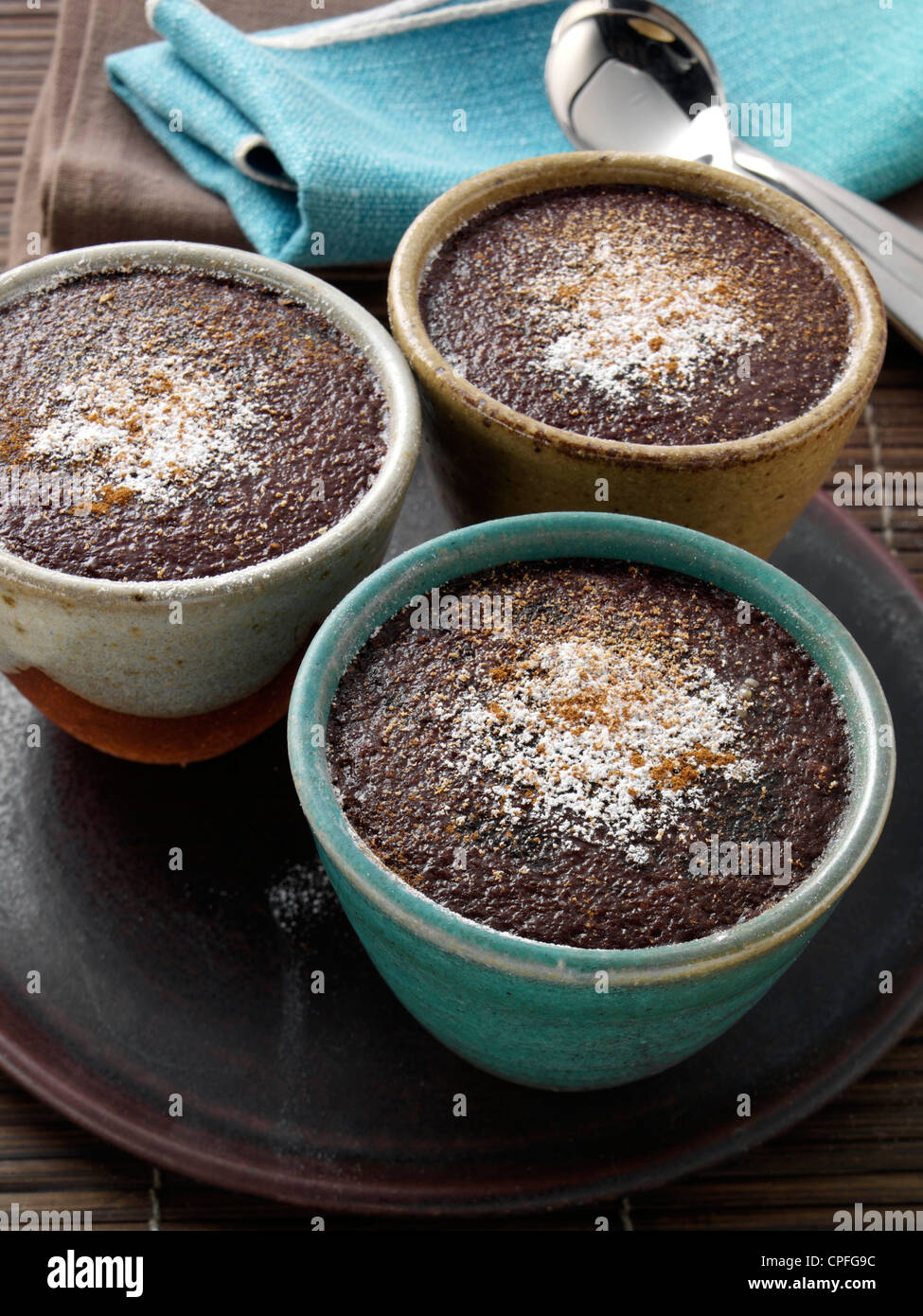 Individual portions of banana fudge pudding Stock Photo Alamy