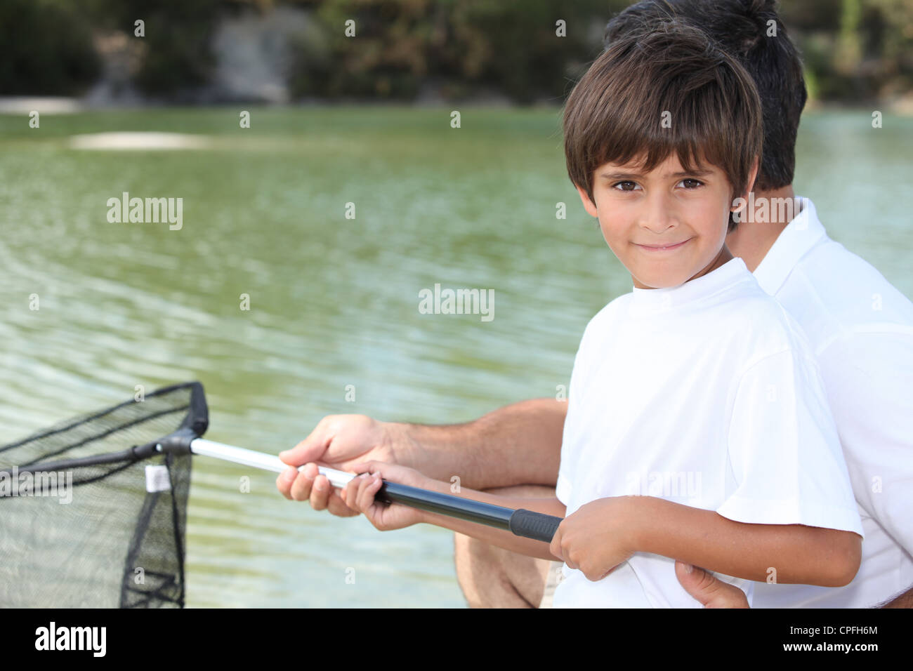 Fisherman cast net early hi-res stock photography and images - Alamy