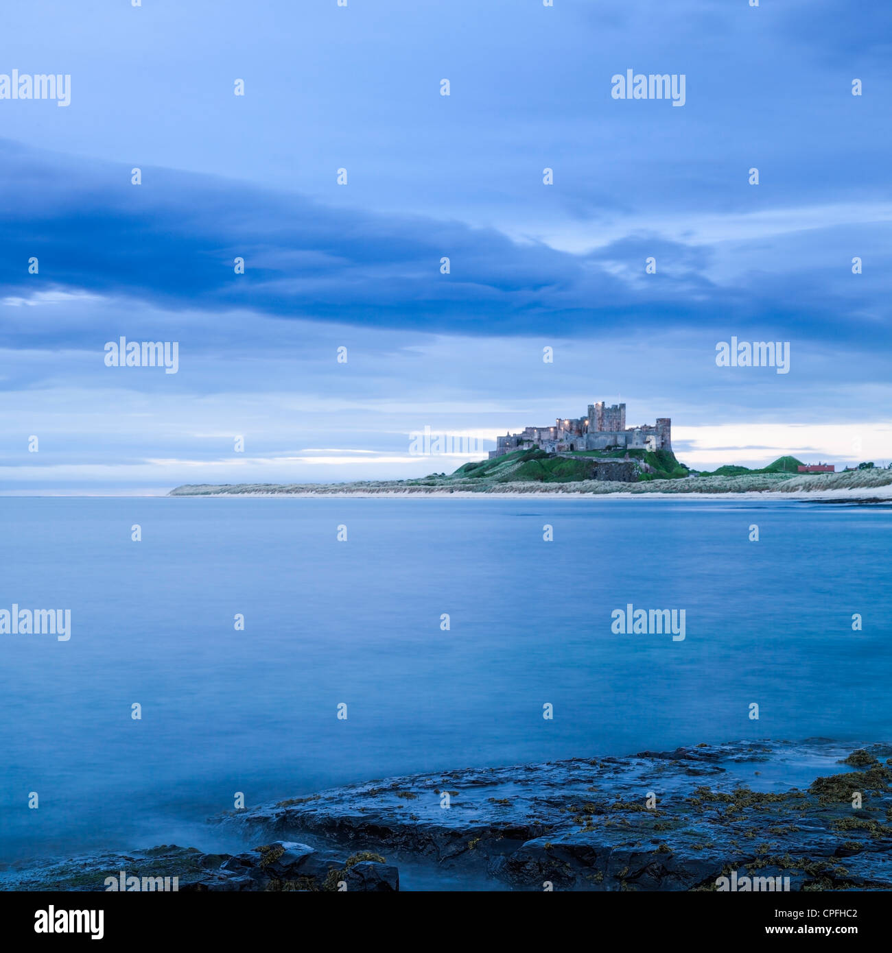 Bamburgh Castle on the Northumberland Coast, England.  Focus on foreground. Stock Photo