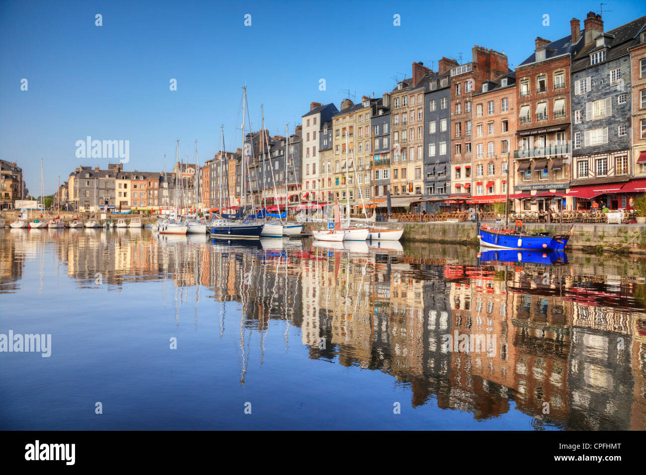 A summer morning in the medieval port of Honfleur, Normandy, France. Stock Photo